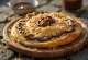 Martabak Manis au Nutella, un délice plié en deux avec Nutella et graines de sésame sur le dessus.