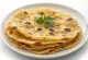 Bengan na thepla, servi avec de l'aubergine et des épices